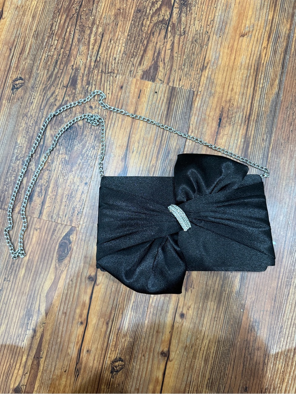 Elegant sparkly black clutch bag with detachable chain
